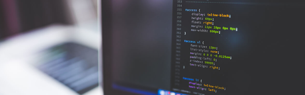 gray-laptop-computer-showing-html-codes-in-shallow-focus-160107